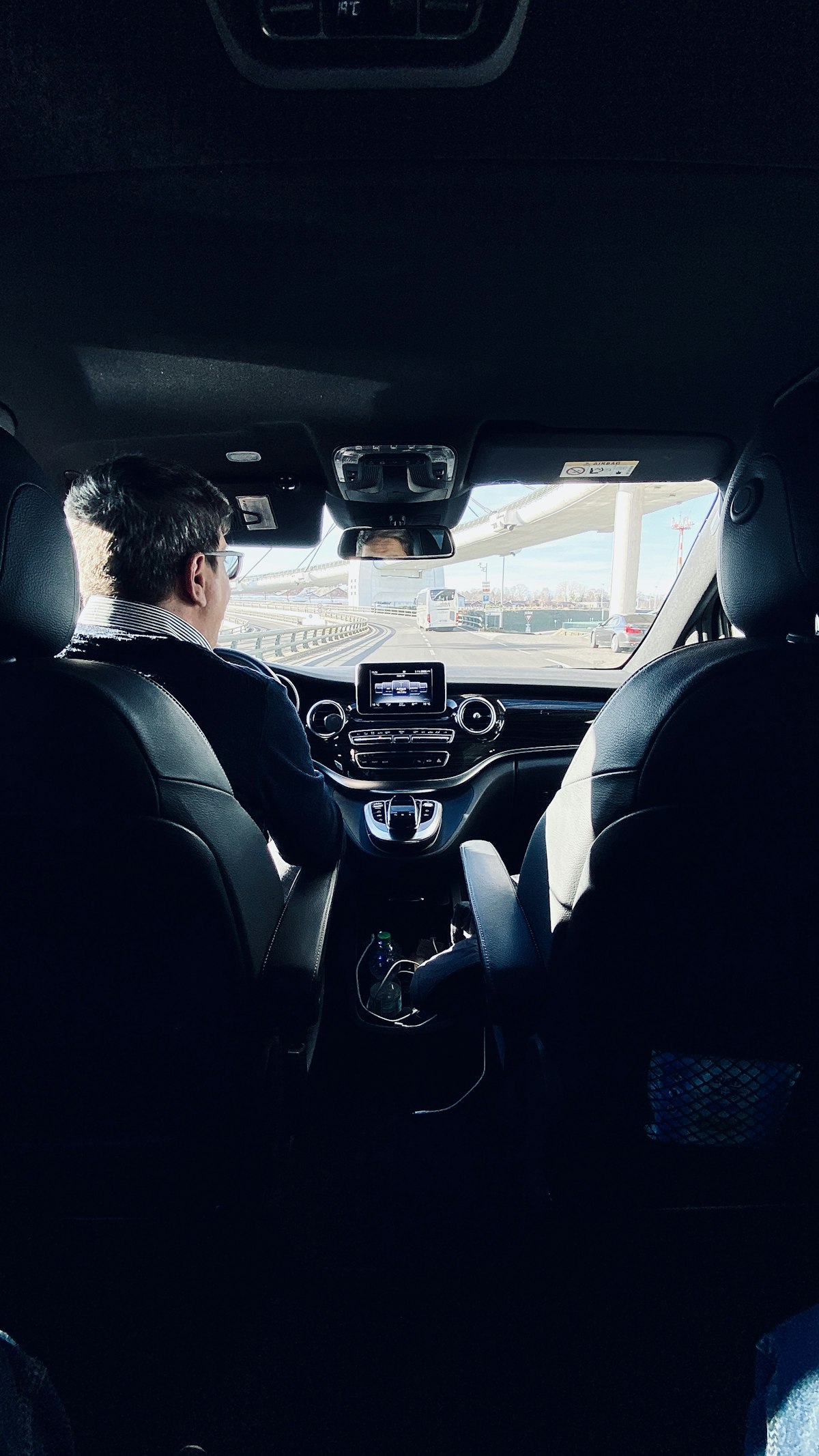 Driver welcoming guests